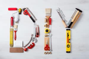 letters D I Y created with tools for lath and plaster removal